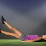 soccer player doing core exercises